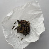 Winter white tea cake - dried leaf